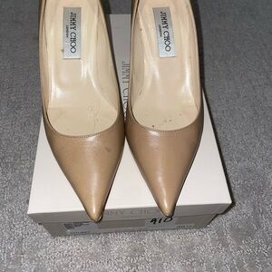 Very nice Jimmy Choo heels! Each shoe has its own dust bag.